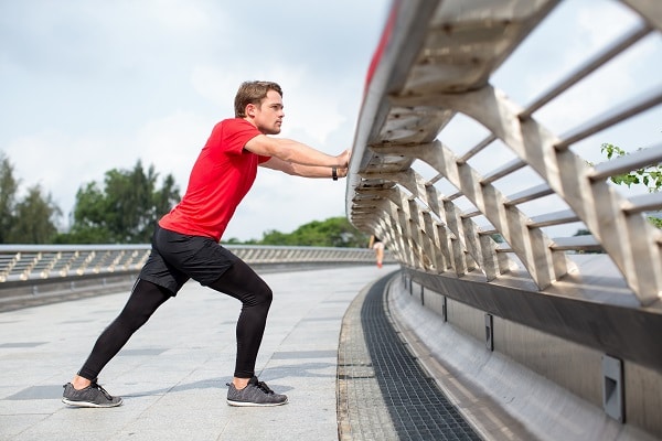 A basic runner's stretch is a great way to prevent Achilles pain.