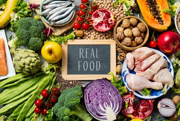 Picture of a table of real food, similar to what is eaten while on the ChiroThin Program.
